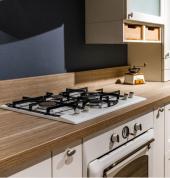 Modern kitchen renovation using natural materials and using gas hob.