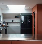Contemporary kitchen renovation with sleek cabinetry, modern appliances, and high quality finishes.