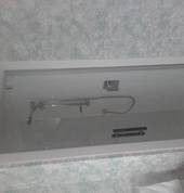 We installed this shower after removing the old one and dropping the drain