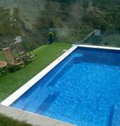 X Trainer 8.2 Pool in Royal Blue installed on sloping section