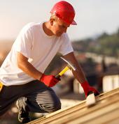 Roofer in levin repairing the roof